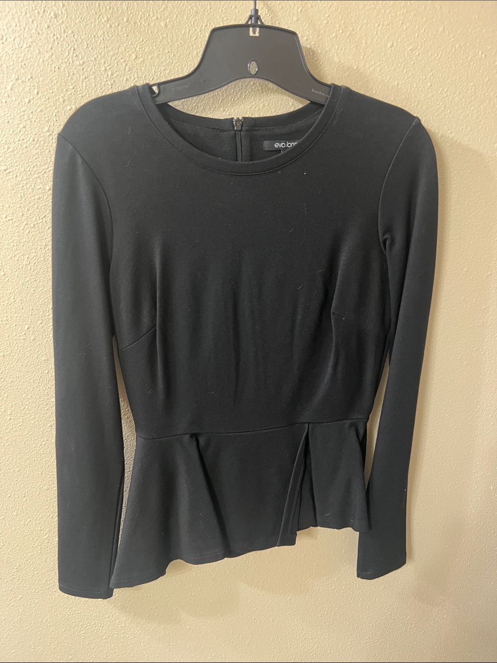 Eva Longoria Black Long-Sleeve Peplum Crewneck Top